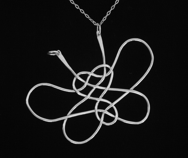 Three-loop Prolong Knot with stretched loops, suspended from one antenna.