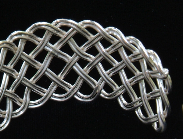 Detail of doubled 7-lead sinnet bracelet.
