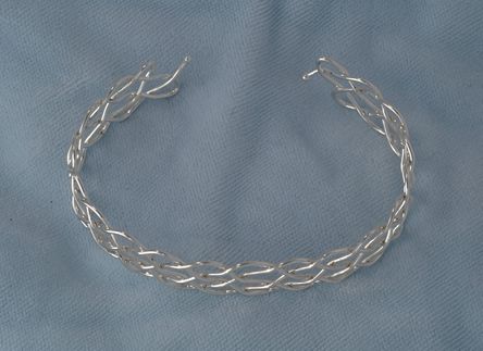Five part chain knot, nineteen loops.
