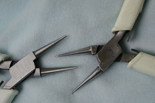 Round nosed pliers.