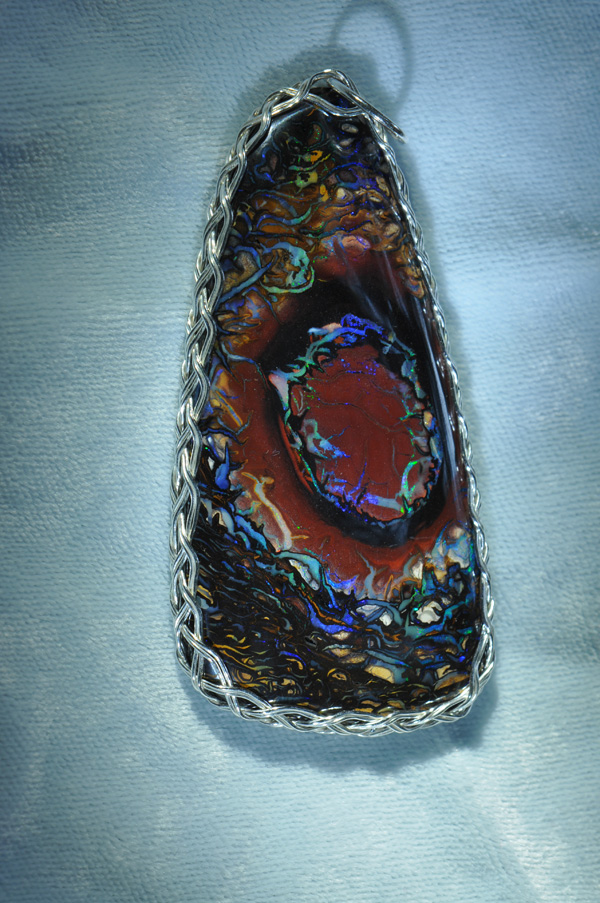 one side of large opal pendant