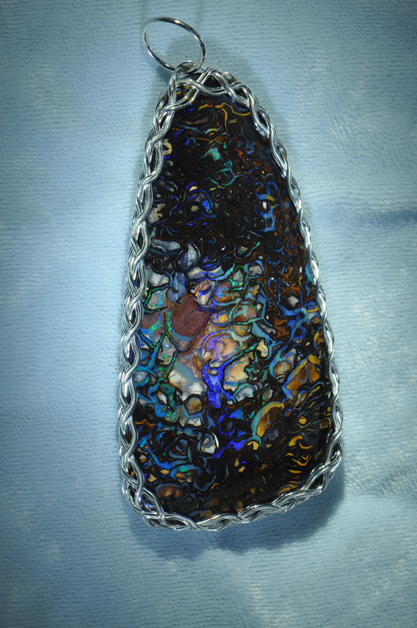 one side of big opal pendant