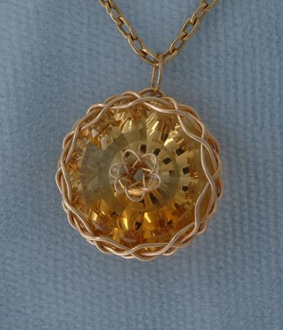 Front view of citrine Torus.